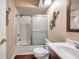 Bathroom features vanity with modern sink and shower with sliding glass door at 2700 Nebraska Ave # 3-201, Palm Harbor, FL 34684