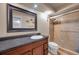 Bathroom featuring tile flooring, shower and large vanity with granite counter top at 2700 Nebraska Ave # 3-201, Palm Harbor, FL 34684