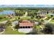 An aerial view of a beautiful clubhouse and event venue in a scenic location at 5211 Lake Venice Dr, Wimauma, FL 33598