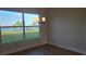 Bright dining room with stunning water view at 5211 Lake Venice Dr, Wimauma, FL 33598