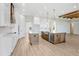 Modern kitchen with a center island, stainless steel appliances, and custom cabinetry at 5211 Lake Venice Dr, Wimauma, FL 33598