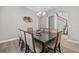 Bright dining room with modern decor and wooden floor at 6307 Brevada Ln, Apollo Beach, FL 33572