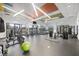 Spacious gym featuring modern exercise equipment, natural light, and contemporary design elements for an active lifestyle at 6307 Brevada Ln, Apollo Beach, FL 33572