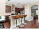 Kitchen with stainless steel appliances and breakfast bar with seating at 8811 Casablanca Way, Tampa, FL 33626