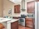 Well-equipped kitchen showcasing stainless steel appliances and ample countertop space at 8811 Casablanca Way, Tampa, FL 33626
