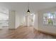 Spacious open-concept living area with abundant natural light and modern finishes at 1946 Hammocks Ave, Lutz, FL 33549
