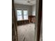 Bedroom featuring a ceiling fan and multiple windows for great natural lighting at 410 W Lemon St, Tarpon Springs, FL 34689