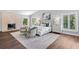 Spacious bedroom featuring a fireplace, a comfortable seating area and large windows at 16403 Zurraquin De Avila, Tampa, FL 33613