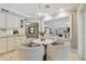 Cozy dining area with counter, cabinets and view to the living space at 16403 Zurraquin De Avila, Tampa, FL 33613