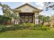 Grand home with large front porch, stone accents and beautiful landscaping at 16403 Zurraquin De Avila, Tampa, FL 33613