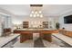 Entertaining game room with pool table, modern lighting, and classic decor at 16403 Zurraquin De Avila, Tampa, FL 33613