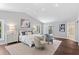A luxurious main bedroom with vaulted ceilings, lots of light, and a private balcony at 16403 Zurraquin De Avila, Tampa, FL 33613