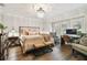 A beautiful bedroom with hardwood floors, sitting area, hardwood floors and natural light at 16403 Zurraquin De Avila, Tampa, FL 33613