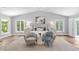 A luxurious main bedroom with vaulted ceilings, lots of light, and a private balcony at 16403 Zurraquin De Avila, Tampa, FL 33613