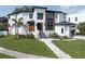 Stunning modern home with a landscaped yard and striking architectural details at 2622 N Dundee St, Tampa, FL 33629