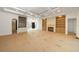 Large living room with tile details, fireplace, and custom built in cabinets at 2622 N Dundee St, Tampa, FL 33629