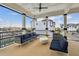 Comfortable balcony featuring stylish seating and views of the surrounding community and marina at 3027 Bermuda Sloop Cir, Ruskin, FL 33570