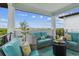 Relaxing balcony with comfortable seating and stunning city views at 3027 Bermuda Sloop Cir, Ruskin, FL 33570