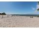 Sandy beach with blue skies and clear water at 3027 Bermuda Sloop Cir, Ruskin, FL 33570