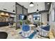 Stylish lounge area with comfortable seating, modern decor, and a recreational pool table at 3027 Bermuda Sloop Cir, Ruskin, FL 33570