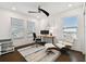Inviting office space with natural light, modern furniture, and a serene waterfront view at 3027 Bermuda Sloop Cir, Ruskin, FL 33570