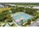 Aerial view of community tennis and pickleball courts, perfect for active recreation at 3027 Bermuda Sloop Cir, Ruskin, FL 33570