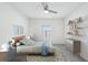 Digitally staged bedroom featuring a neutral color palette, gray carpet, and minimalist decor at 31814 Oyster Trellis Ln, Wesley Chapel, FL 33545