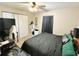 Comfortable bedroom with cozy carpet, neutral walls, and sufficient closet space at 37634 Hidden Park Ct, Dade City, FL 33525