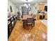 Cozy dining area featuring a dining table and traditional chandelier, perfect for Gathering meals at 37634 Hidden Park Ct, Dade City, FL 33525