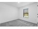 Sunny bedroom with large window bringing the outdoors in and providing ample natural light at 4621 Kenoska St, North Port, FL 34288