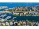Breathtaking aerial view of a coastal community with a marina, waterways, and diverse residential properties at 5166 39Th S St, St Petersburg, FL 33711
