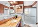 Bright bathroom with granite countertop, and a walk-in shower with grab bar at 5166 39Th S St, St Petersburg, FL 33711