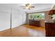 Cozy bedroom with a large window, built-in wardrobes, and a vintage dresser at 5166 39Th S St, St Petersburg, FL 33711