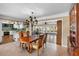 Bright dining area showcasing an open floorplan, tile flooring, and direct kitchen and backyard access at 5166 39Th S St, St Petersburg, FL 33711