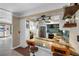 Updated kitchen showcasing granite countertops, custom lighting, stainless steel appliances and an open concept design at 5166 39Th S St, St Petersburg, FL 33711