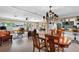 Open floorplan featuring a living room with bright natural light, tile flooring, and backyard views at 5166 39Th S St, St Petersburg, FL 33711