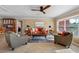 Inviting living room with a large window, stylish furnishings, and a cozy atmosphere at 5166 39Th S St, St Petersburg, FL 33711