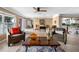 Spacious living room with neutral décor, tile floors, and an open layout leading to other areas at 5166 39Th S St, St Petersburg, FL 33711