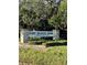 Fort De Soto Park sign surrounded by lush landscaping and mature trees in a well-maintained area at 5166 39Th S St, St Petersburg, FL 33711