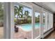 Inviting backyard pool area with brick pavers and lush landscaping at 5166 39Th S St, St Petersburg, FL 33711