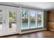 Inviting view of the backyard pool from inside, showcasing natural light and seamless indoor-outdoor living at 5166 39Th S St, St Petersburg, FL 33711