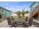 Backyard features a dining set and an outdoor lounge area, perfect for entertaining at 3030 5Th N Ave, St Petersburg, FL 33713