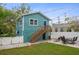 Charming backyard featuring a well-manicured lawn and outdoor dining area at 3030 5Th N Ave, St Petersburg, FL 33713