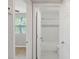 Bathroom with shower over tub and view to the bedroom at 3030 5Th N Ave, St Petersburg, FL 33713