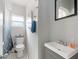 Bathroom with toilet, tub/shower, and vanity with single sink at 3030 5Th N Ave, St Petersburg, FL 33713