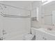 Bright bathroom features a shower over tub, subway tiles, and modern fixtures at 3030 5Th N Ave, St Petersburg, FL 33713