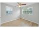 Bright bedroom with lots of natural light, ceiling fan, and wood floors at 3030 5Th N Ave, St Petersburg, FL 33713