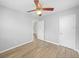 Cozy bedroom with ceiling fan, wood floors and access to the hallway at 3030 5Th N Ave, St Petersburg, FL 33713