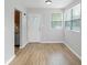 Cozy dining area featuring hardwood floors and an open view of the kitchen at 3030 5Th N Ave, St Petersburg, FL 33713