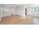 Bright and airy living room with modern hardwood flooring and neutral paint at 3030 5Th N Ave, St Petersburg, FL 33713